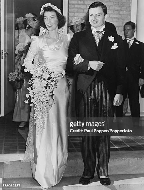 Businessman David Rockefeller, the youngest son of financier John D Rockefeller Jr, with his bride Margaret McGrath leave St Matthew's Church, New...