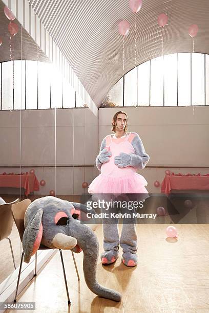 elephant entertainer after children's party - mascot foto e immagini stock