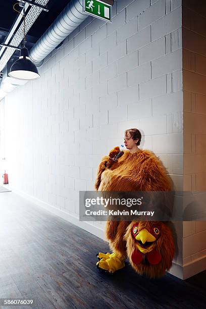 chicken costume mascot after event - man with animal head stock pictures, royalty-free photos & images