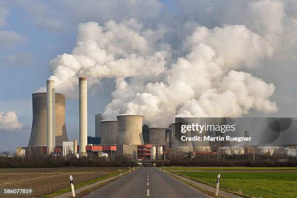 road to coal fired power station niederaussem - fossil fuel stock pictures, royalty-free photos & images
