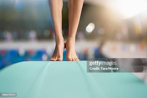 feet on diving board - woman diving board stock pictures, royalty-free photos & images