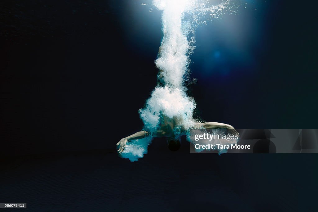 Man diving into water