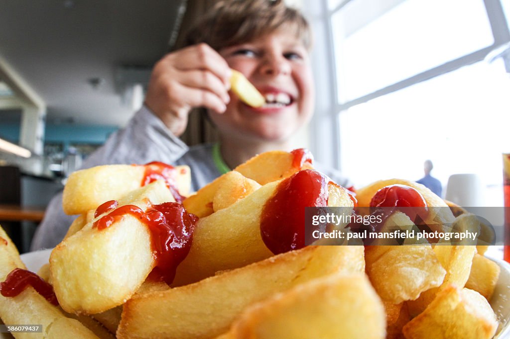 Boy eating chips