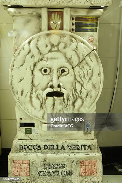 Fortune-telling machine is set at an underground mall in People's Square on August 4, 2016 in Shanghai, China. Only three coins one can receive a...