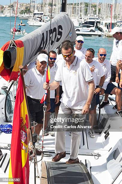 King Felipe VI of Spain poses with Aifos Team omboard Aifos during 35th Copa Del Rey Mafre Sailing Cup on August 5, 2016 in Palma de Mallorca, Spain.