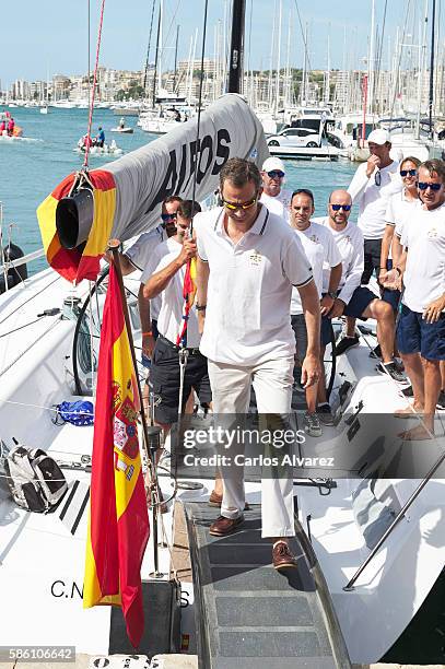 King Felipe VI of Spain poses with Aifos Team omboard Aifos during 35th Copa Del Rey Mafre Sailing Cup on August 5, 2016 in Palma de Mallorca, Spain.