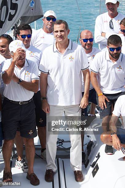 King Felipe VI of Spain poses with Aifos Team omboard Aifos during 35th Copa Del Rey Mafre Sailing Cup on August 5, 2016 in Palma de Mallorca, Spain.