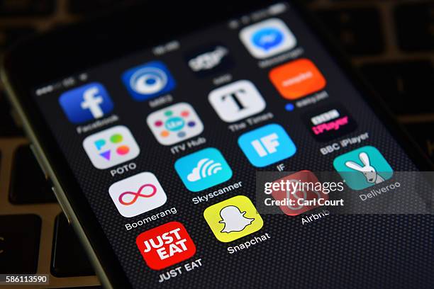 The Snapchat app logo is displayed on an iPhone on August 3, 2016 in London, England.