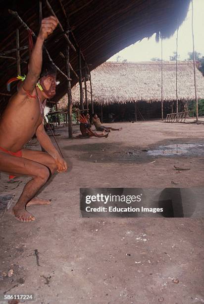 Yanomamo tribal medicine man ceremonial trance caused by ebene. Shampero A - Teri , Venezuela, 1989.