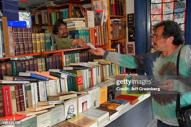 Mexico, Mexico City, Distrito Federal, Ciudad Universitaria, campus, Universidad Nacional Autnoma de Mxico university, bookstore sales clerk.