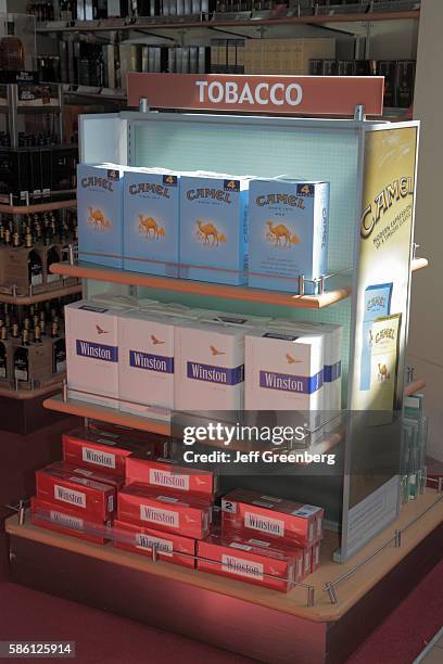 Dominican Republic, Santo Domingo, Las Americas International Airport, duty-free store selling cigarettes .