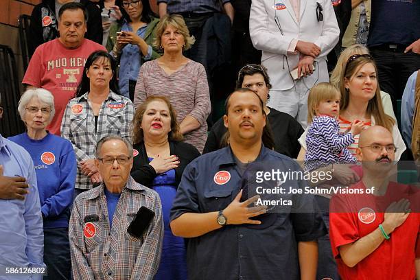 Las Vegas, Nevada, people hold hand over heart for Republican presidential candidate Sen. Ted Cruz at a rally at the Durango Hills Community Center...