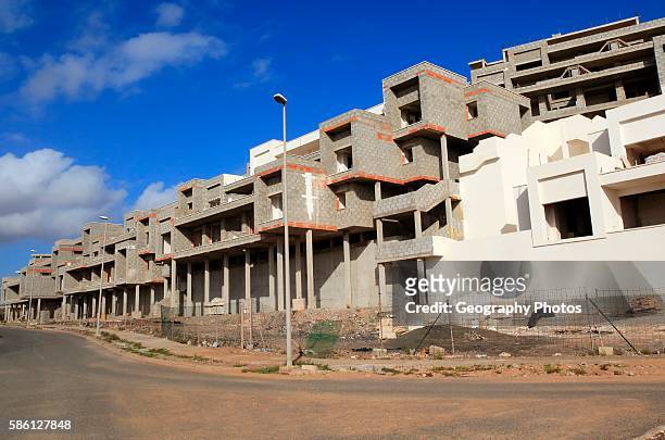 Concrete shells of uncompleted housing in the Castillo development, Caleta de Fuste, Fuerteventura, Canary Islands, Spain.