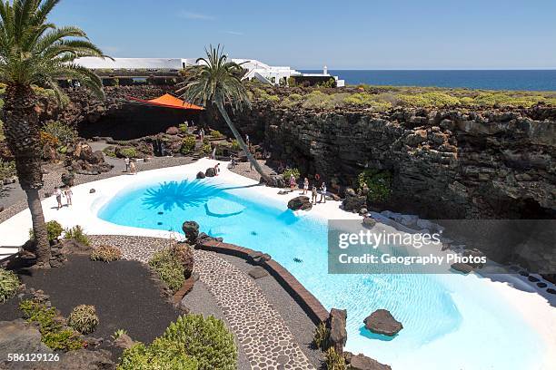 Tropical garden and Jameo Grande swimming pool Jameos de Aqua designed by Cesar Manrique, Lanzarote, Canary Islands, Spain.