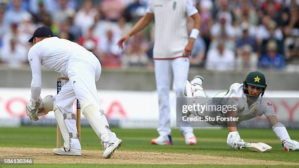 Pakistan batsman Yasir Shah dives full length for his ground but is run out by England wicketkeeper Jonny Bairstow during day 3 of the 3rd Investec...