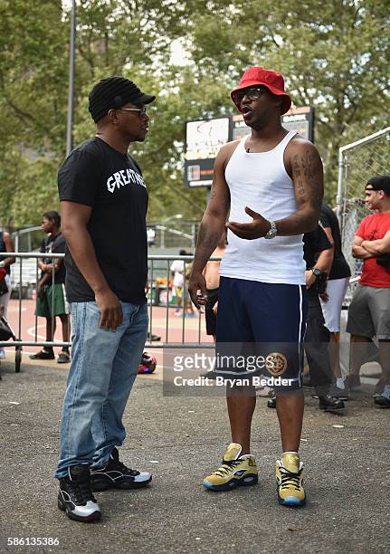 Sway and Cam'ron attend the Launch of the new Reebok Question Mid EBC & A5 with Cam'ron and Jadakiss at Rucker Park on August 4, 2016 in New York...