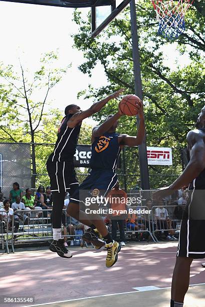 Athletes participate in a basketball game during the Launch of the new Reebok Question Mid EBC & A5 with Cam'ron and Jadakiss at Rucker Park on...