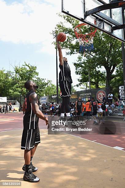 Athletes participate in a basketball game during the Launch of the new Reebok Question Mid EBC & A5 with Cam'ron and Jadakiss at Rucker Park on...