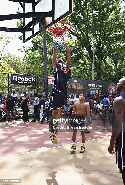 Athletes participate in a basketball game during the Launch of the new Reebok Question Mid EBC & A5 with Cam'ron and Jadakiss at Rucker Park on...