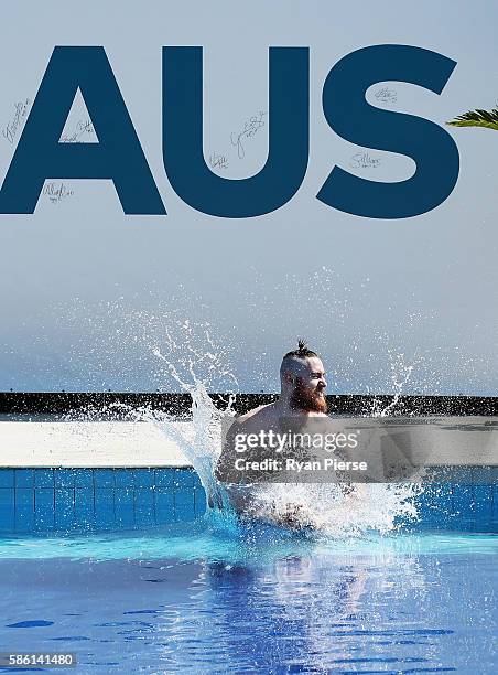 Australian Basketballer Aron Baynes swims during a recovery session at The Edge on August 5, 2016 in Rio de Janeiro, Brazil.
