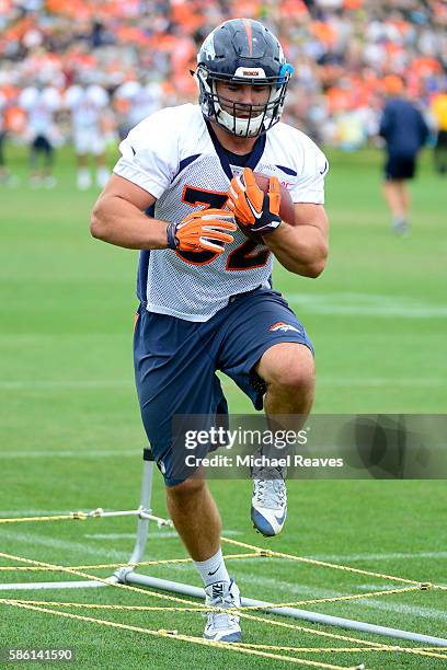 Denver Broncos fullback Andy Janovich runs a drill during practice at training camp on August 2016 in Dove Valley.