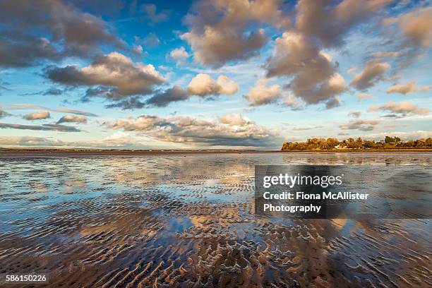 coastal mirror at bowness-on-solway - cumbrian coast stock pictures, royalty-free photos & images