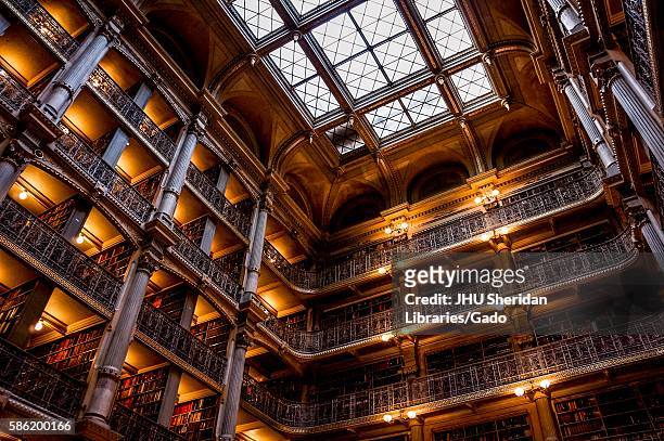 Low camera angle shot of the George Peabody Library at Johns Hopkins University, 2016. Courtesy Eric Chen. .