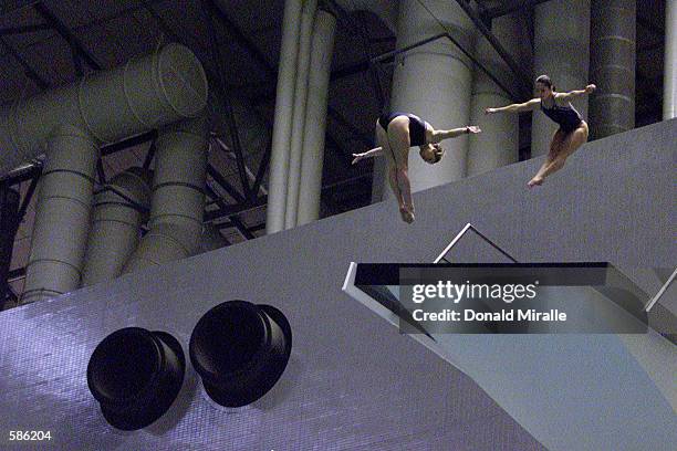 Loudy Tourky and Rebecca Gilmore of Australia compete in the Women's 10M Synchronized Diving Competition prelims at the Fukuoka Prefectorual Pool...