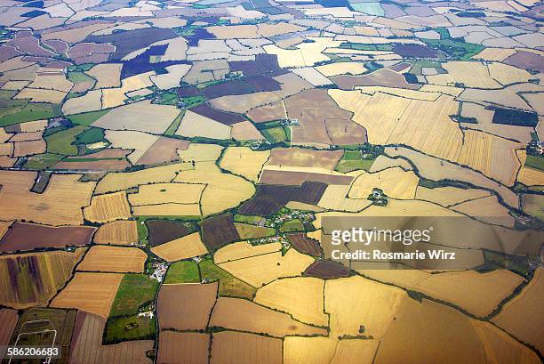 english countryside aerial view - stubble stock-fotos und bilder