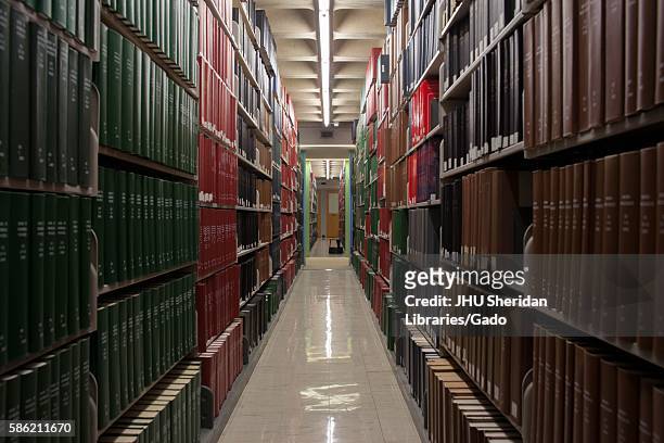 Photograph looking down the stacks of the library at Johns Hopkins University, 2014. Courtesy Eric Chen. .