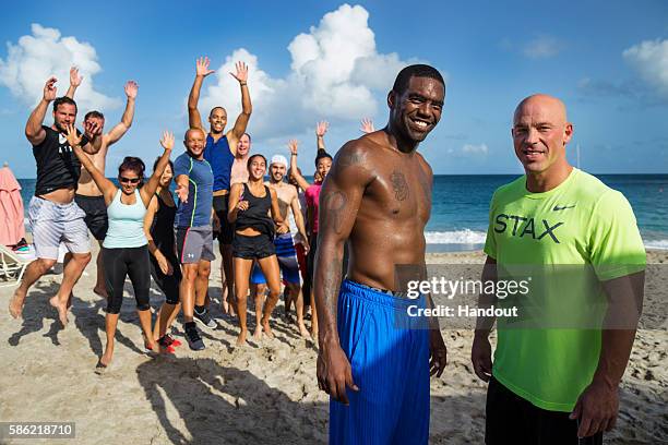 In this handout photo provided by Sunswept Resorts, Randy Moss, former NFL superstar and newly appointed ESPN broadcaster, leads the BodyHoliday's...