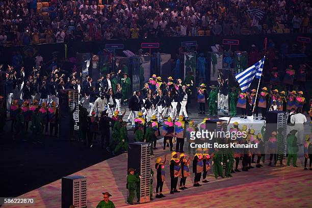 Sofia Bekatorou of Greece carries her country's flag during the Opening Ceremony of the Rio 2016 Olympic Games at Maracana Stadium on August 5, 2016...