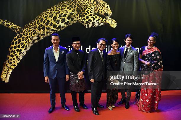 Actor Nicholas Saputra, Shaheizy Sam, Director Dain Iskandar Said, Prisia Nasution, Iedil Putra and Nandita Solomon attend on the red carpet during...