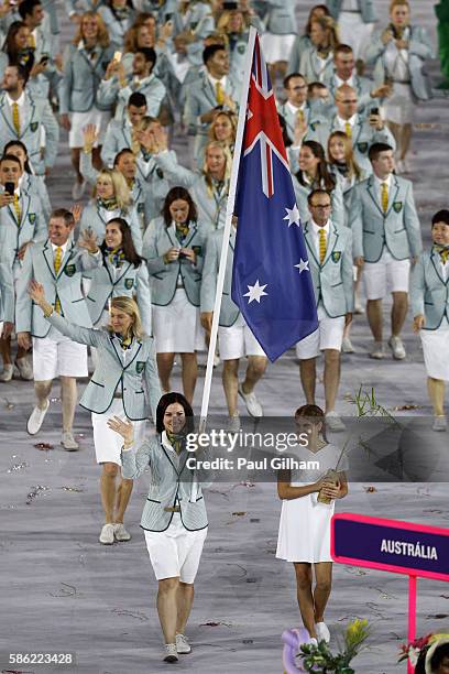 Anna Meares of Australia carries her country's flag during the Opening Ceremony of the Rio 2016 Olympic Games at Maracana Stadium on August 5, 2016...