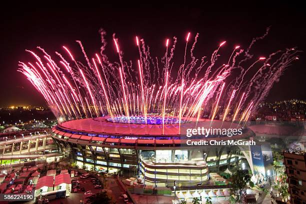 Fireworks explode over the Maracana Stadium during the opening ceremony of the Rio 2016 Olympic Games on August 5, 2016 in Rio de Janeiro, Brazil....