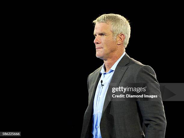 Hall of Fame enshrinee, quarterback Brett Favre is greeted by the crowd during the Pro Football Hall of Fame Gold Jacket Dinner on August 4, 2016 at...