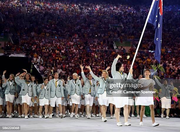 Anna Meares of Australia carries the flag during the Opening Ceremony of the Rio 2016 Olympic Games at Maracana Stadium on August 5, 2016 in Rio de...