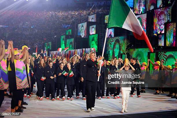 Flag bearer Federica Pellegrini of Italy leads her team during the Opening Ceremony of the Rio 2016 Olympic Games at Maracana Stadium on August 5,...