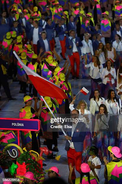 Flag bearer Karol Bielecki of Poland leads his team during the Opening Ceremony of the Rio 2016 Olympic Games at Maracana Stadium on August 5, 2016...