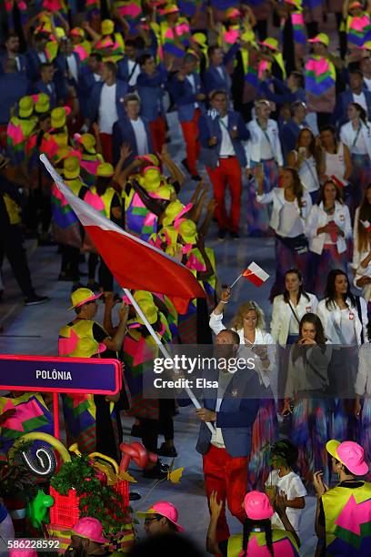 Flag bearer Karol Bielecki of Poland leads his team during the Opening Ceremony of the Rio 2016 Olympic Games at Maracana Stadium on August 5, 2016...