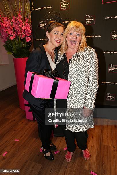 Christine Kaufmann and Inger Nilsson during the late night shopping at Designer Outlet Soltau on August 5, 2016 in Soltau, Germany.