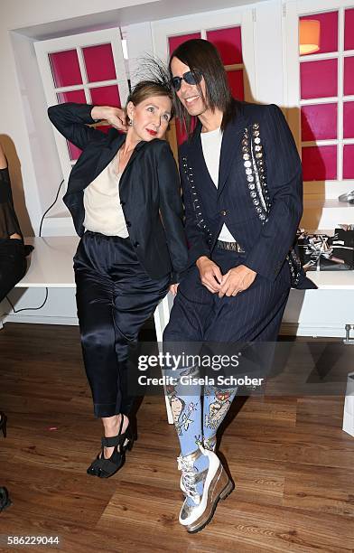 Christine Kaufmann and Jorge Gonzalez during the late night shopping at Designer Outlet Soltau on August 5, 2016 in Soltau, Germany.