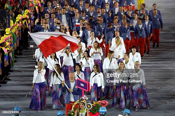 Flag bearer Karol Bielecki of Poland leads his team during the Opening Ceremony of the Rio 2016 Olympic Games at Maracana Stadium on August 5, 2016...