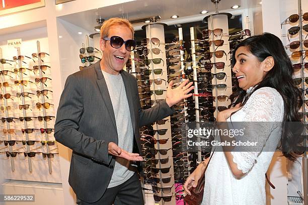 Jahn Hahn and Collien Ulmen-Fernandes during the late night shopping at Designer Outlet Soltau on August 5, 2016 in Soltau, Germany.