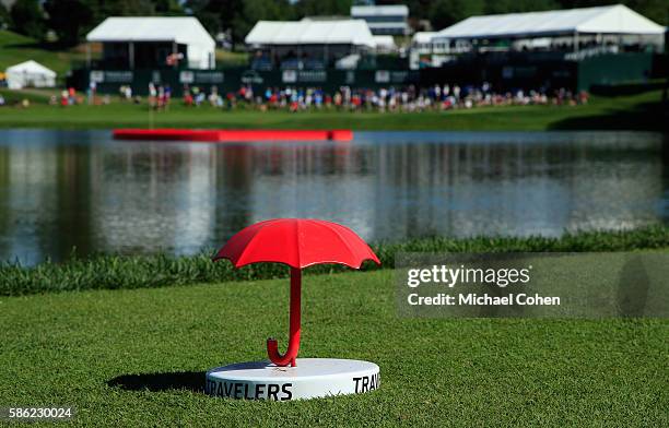 Traveler's umbrella is seen during the second round of the Travelers Championship at the TPC River Highlands on August 5, 2016 in Cromwell,...