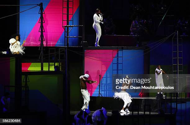 Performers dance during the Opening Ceremony of the Rio 2016 Olympic Games at Maracana Stadium on August 5, 2016 in Rio de Janeiro, Brazil.