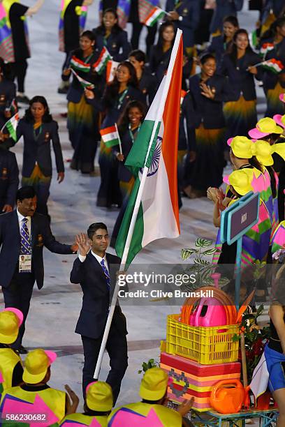 Abhinav Bindra of India carries the flag during the Opening Ceremony of the Rio 2016 Olympic Games at Maracana Stadium on August 5, 2016 in Rio de...