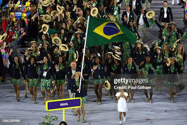 Flag bearer Yane Marques of Brazil leads her Olympic Team during the Opening Ceremony of the Rio 2016 Olympic Games at Maracana Stadium on August 5,...