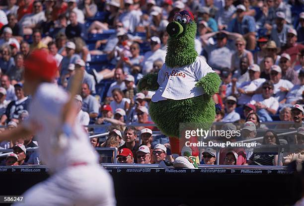 The Philadelphia Phillies mascot, Philly Phanatic performs during the game against the Baltimore Orioles at the Veterans Stadium in Philadelphia,...