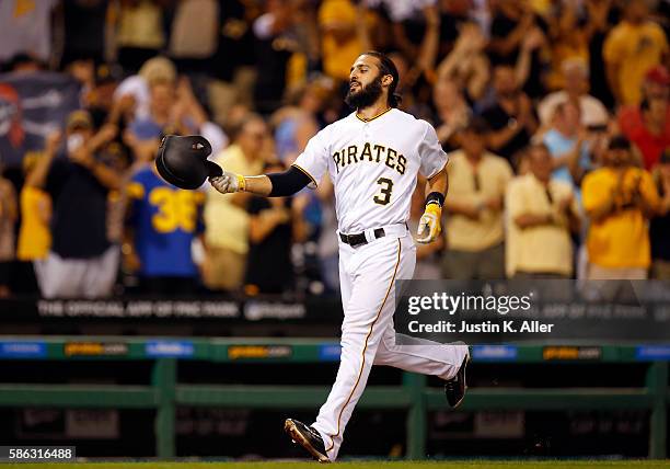 Sean Rodriguez of the Pittsburgh Pirates celebrates after hitting a walk off home run in the ninth inning during the game against the Cincinnati Reds...